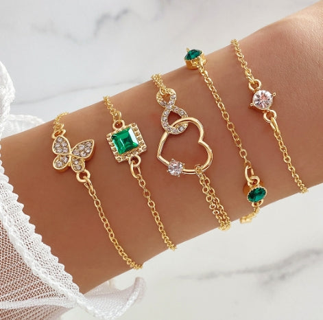 Gold Colored Charm Bracelet Set with Green and Clear Crystals