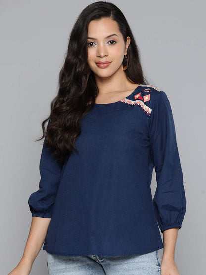 Embroidered blue top